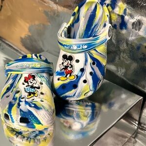 CROCS Blue and Green Slippers with Playful Design